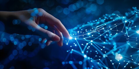 A hand touching digital network with light effect on dark blue background, futuristic technology concept for business and internet of things.