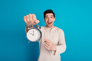 Sticker - Photo of nice young man point finger alarm wear pajama isolated on blue color background