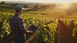 © The Little Hut - Farmer using smart farming technologies in a vineyard : Generative AI
