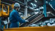 © The Little Hut - A technician wearing blue overalls and a white helmet operates machinery at an industrial recycling facility where he manages the sorting and processing of refusederived fuel RDF on a  : Generative AI