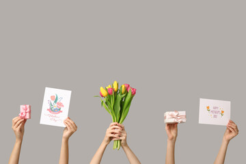 Sticker - Women with gifts, drawings and tulips on light background. Mother's Day celebration