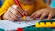 © The Little Hut - CloseUp Of A Primary School Childs Hand Doing Math Homework Back To School : Generative AI