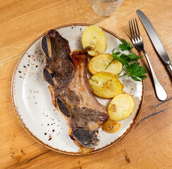 Wall Mural - Delicious beef steak with fried potatoes served on plate