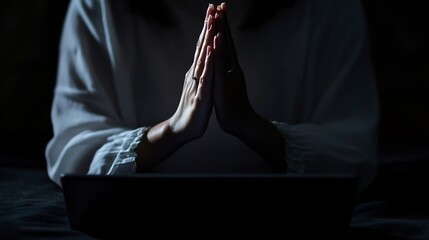 Wall Mural - Christian online religion technology concept Hands praying of christian with digital computer laptop Online live church for sunday service Asian woman praying in darkness with computer : Generative AI