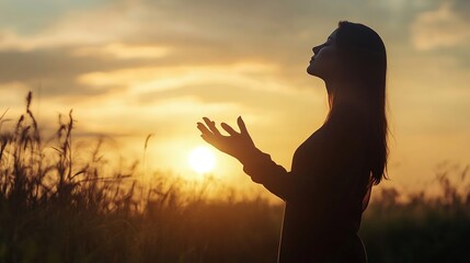 Silhouette of prayer woman worship God in the morning with sunrise sky background Person hands open palm up worship God helping repent catholic easter lent mind pray Christian religion : Generative AI