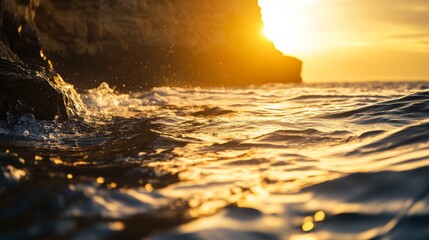 Wall Mural - Ocean waves during sunset with rocky cliffs