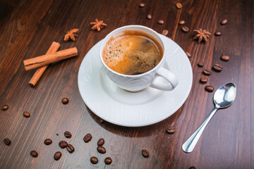 cup of coffee on wooden table