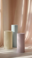 Wall Mural - Pastel-colored cylindrical podiums with soft pink