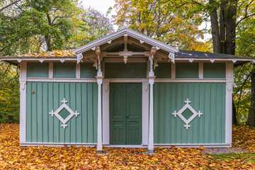 Sticker - Green cottage in a park at autumn