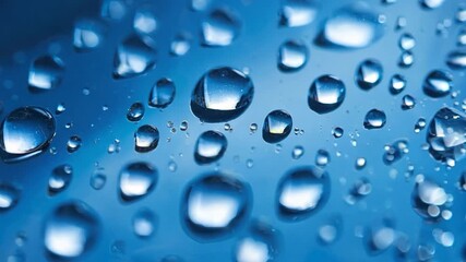 Leinwandbilder - water drops on a blue background