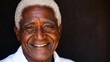 © anantachat - A dignified elderly black man with deep wrinkles and a serene expression symbolizing a life full of wisdom and experience Stock Photo with copy space