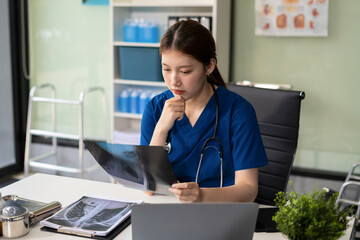 Wall Mural - Medical Technology Concepts. Medical students use mobile phones to search for information in a modern office in the morning at the desk.