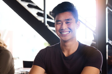 Poster - Happy asian man, portrait and designer with ambition, creative mindset or career startup at office. Face of young male person or employee with smile for internship or job opportunity at workplace