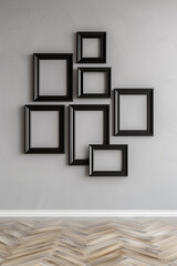 Modern interior design concept gray wall with  empty black frames set 