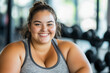 © CreativeInside - A fat girl sitting in the gym, exercising, taking care of her fitness