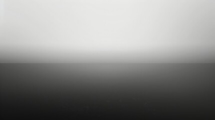 A simple gray gradient background with a subtle horizon line.