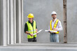 © Poguz.P - Engineer and foreman worker team inspect the construction site, Site manager and builder on construction site