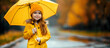 © MonkaLemonka - small, cute 6 - 7 years old girl in yellow raincoat with yellow umbrella outside; smiled kid under the rainy weather; autumn/fall background; copy space