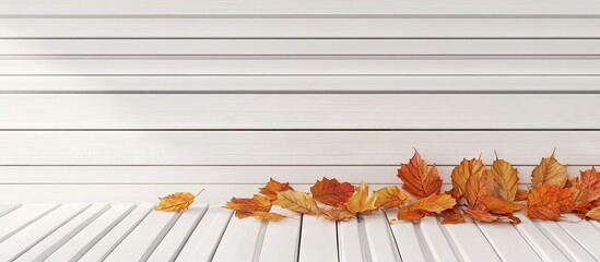 Aufkleber - Fallen autumn leaves rest on a white bench Autumn theme. with copy space image. Place for adding text or design