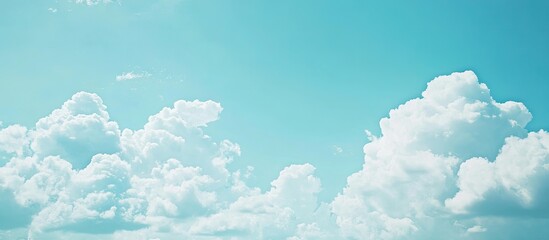 Sticker - Light blue sky featuring white clouds suitable for a background or texture Copy space