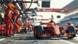 © Dina Photo Stories - Professional pit crew in red uniform ready for action as their team's race car arrives in pit lane during a pitstop of a car race, concept of Professional teamwork. Front view racing car on pit stop