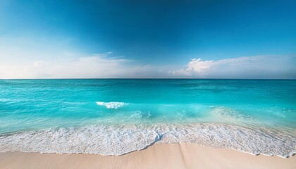 Turquoise water lapping on white sand