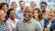 © Man888 - Smiling middle-aged African American man in eyeglasses surrounded by diverse group of people offering emotional support and encouragement in a safe therapeutic setting.