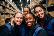 © NikoG - Smiling portrait of a young and diverse group of women in warehouse