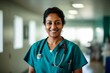 © NikoG - Smiling portrait of a middle aged Indian nurse in hospital