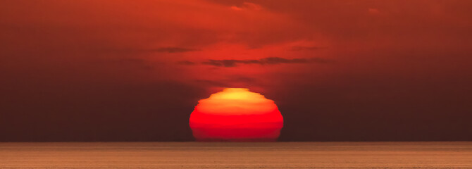 Wall Mural - Dramatic Colorful Sunrise Sky over Alboran Sea. Abstract Red Sky. Cloudscape Background