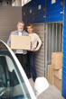 © Svitlana - Female and male working in self storage unit