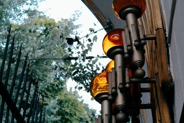 Orange lamps on a sunny summer day Kyiv