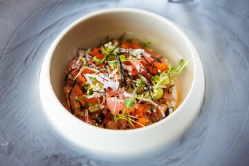 Wall Mural - Tuna tartare. Ponzu sauce, chives, cucumber, masago and nori. Delicious healthy Italian traditional food closeup served for lunch in modern gourmet cuisine restaurant