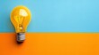 © Login - A light bulb on a blue-yellow background. Success, leadership, achievement, idea and concept of purpose. Illustration for banner, poster, cover, brochure or presentation.