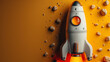 © Altura - Cute rocket toy is launching on orange background copy space.Panoramic shot. Generative AI.