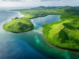 Beautiful aerial photograph of a lush green landscape with rolling hills and crystal-clear blue water, showcasing the natural beauty and serenity of this remote location.