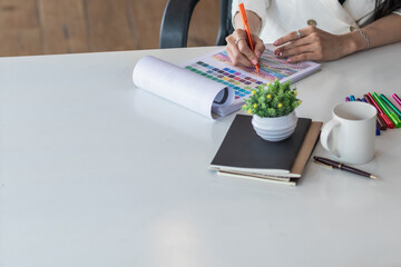 Wall Mural - smooth focus, group of web designers are working together to develop mobile responsive website with 
