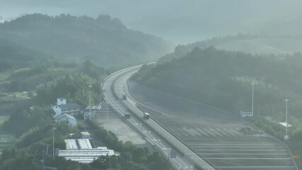 Wall Mural - highway along valley in fog