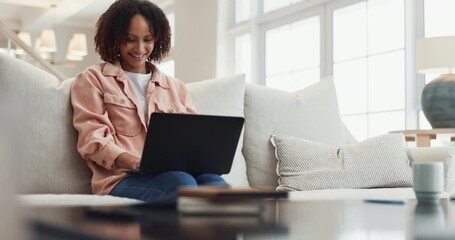 Canvas Print - Woman, reading and laptop on couch for tax compliance with planning, budget or research for economy. Person, computer and thinking for mortgage, loan or home with smile for financial review in Brazil