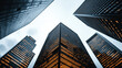 © Patrick - Low angle view of illuminated skyscrapers at dusk, urban architecture and corporate power concept