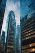 © EVISUAL - Urban Skyline: essence of modern city life with this dynamic image of towering skyscrapers in the heart of the financial district. generative AI