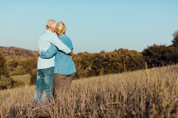 Wall Mural - woman man outdoor senior couple happy lifestyle retirement together smiling love old nature mature