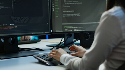 computer scientist in data center installing software on computer, troubleshooting issues, handheld 