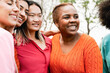 © Vane Nunes - Diverse group of women having fun together. Happy multicultural people hugging each other outdoor. Focus on black curvy girl