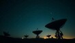 © abu - A network of large satellite dishes silhouetted against the night sky, antennas pointed toward stars, transmitting and receiving data from space. Lit by the faint glow of distant galaxies, showcasing
