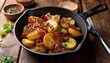 © Visual Vibes - Rustic fried potatoes with bacon and onions from the iron pan