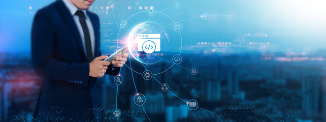 Wall Mural - web development: responsive design, businessman uses tablet and synchronizes with the structure of w