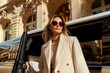 © DigitalMagicVisions - Elegant Woman Arriving at Luxury Hotel in Limousine - Stylish and Luxurious Travel Experience