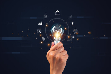 Hand holding lightbulb with AI and digital interface icons. Conceptual technology and innovation background