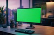 © SemangArt - A Modern Workspace with a Green Screen Monitor